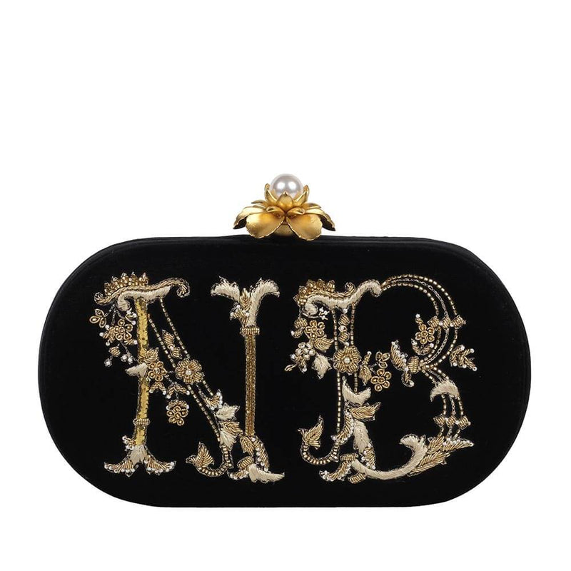 Monogram Oval Clutch Heritage Black